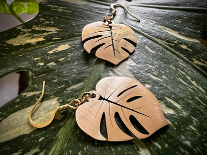 Laser cut brass Monstera Deliciosa leaf dangle earrings in brushed or polished finish, lightweight and handmade.