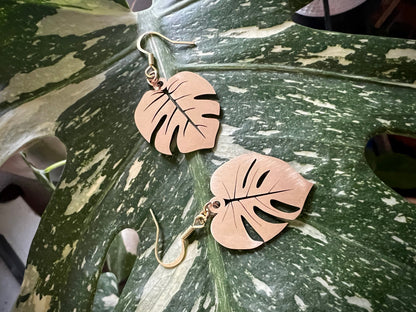 Laser cut brass Monstera Deliciosa leaf dangle earrings in brushed and polished finishes